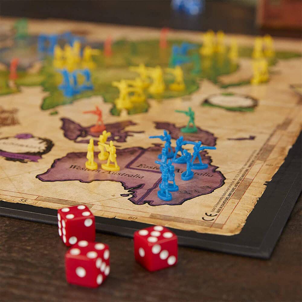 RISK : THE GAME OF STRATEGIC CONQUEST by Hasbro