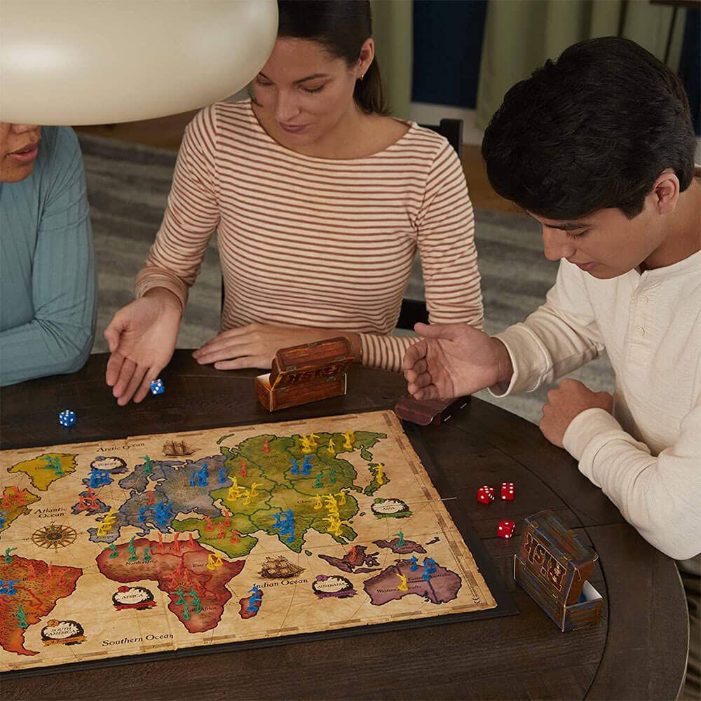 RISK : THE GAME OF STRATEGIC CONQUEST by Hasbro